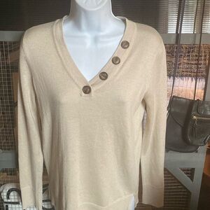 Tan sweater…Pink Clover brand size small
